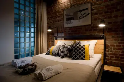 Łóżko lub łóżka w pokoju w obiekcie Apartamenty Folwark Boguszyn