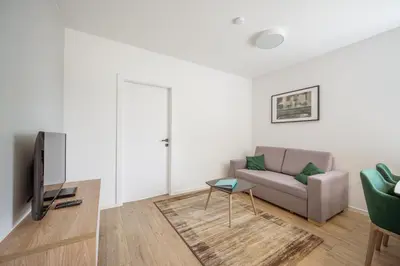 Telewizja i/lub zestaw kina domowego w obiekcie Marina Apartments ZOO