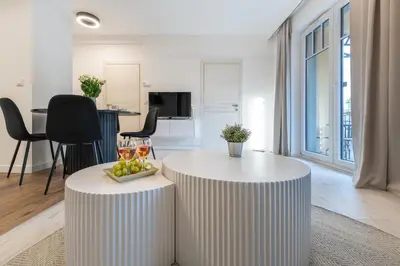 Telewizja i/lub zestaw kina domowego w obiekcie LAGUNA 20 Apartament Elegancki