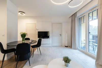 Telewizja i/lub zestaw kina domowego w obiekcie LAGUNA 20 Apartament Elegancki