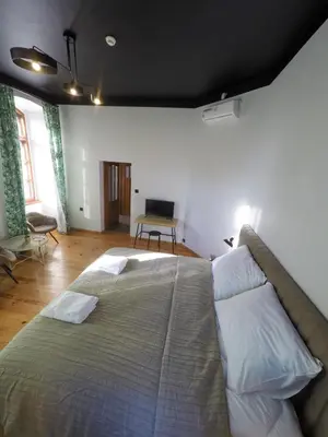 Łóżko lub łóżka w pokoju w obiekcie Apartamenty w Wieży