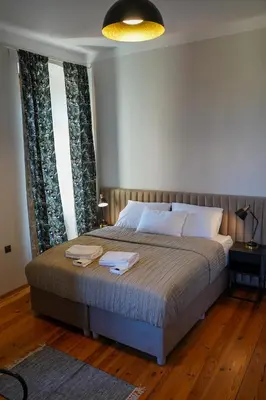 Łóżko lub łóżka w pokoju w obiekcie Apartamenty w Wieży