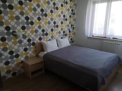 Łóżko lub łóżka w pokoju w obiekcie Apartament Marzenie 12 - Opole