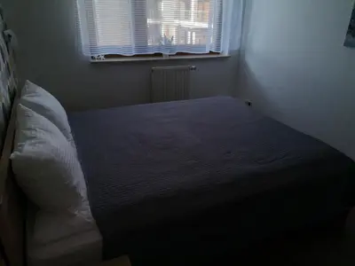 Łóżko lub łóżka w pokoju w obiekcie Apartament Marzenie 12 - Opole