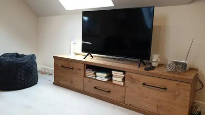 Telewizja i/lub zestaw kina domowego w obiekcie LAGUNA Apartament 30 Willa Maria
