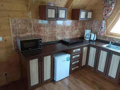 Kuchnia lub aneks kuchenny w obiekcie Domek Hanka