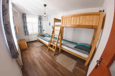Łóżko lub łóżka w pokoju w obiekcie Apartament Marcel