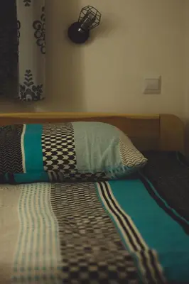 Łóżko lub łóżka w pokoju w obiekcie Apartament Marcel