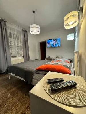 Łóżko lub łóżka w pokoju w obiekcie Apartament Marcel