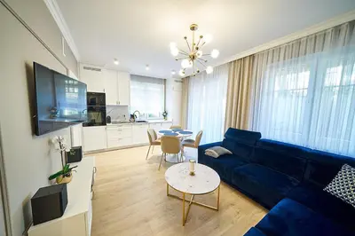 Telewizja i/lub zestaw kina domowego w obiekcie LAGUNA Apartament 5 