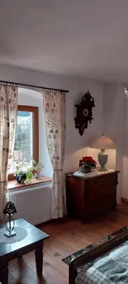 Łóżko lub łóżka w pokoju w obiekcie Gościniec Śliwkowy Sad