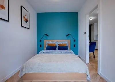Łóżko lub łóżka w pokoju w obiekcie Apartament Kępa Mieszczańska - Old Town- free Parking - 15 min do Rynku