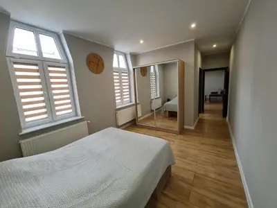Łóżko lub łóżka w pokoju w obiekcie Ines Apartament