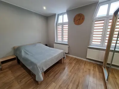 Łóżko lub łóżka w pokoju w obiekcie Ines Apartament