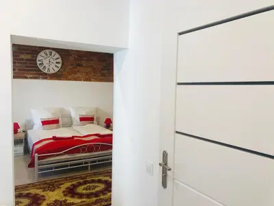 Łóżko lub łóżka w pokoju w obiekcie Willa Sudecka
