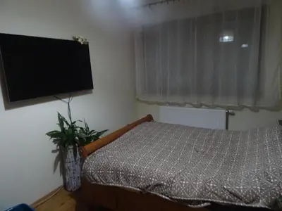 Łóżko lub łóżka w pokoju w obiekcie Apartament w centrum, garaż i jakuzzi w cenie