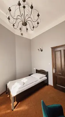 Łóżko lub łóżka w pokoju w obiekcie Legnicki Browar Książęcy Hotel i Restauracja