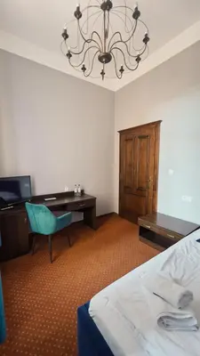Łóżko lub łóżka w pokoju w obiekcie Legnicki Browar Książęcy Hotel i Restauracja