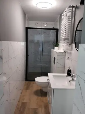 Łazienka w obiekcie Noclegi i sauna w starym domu