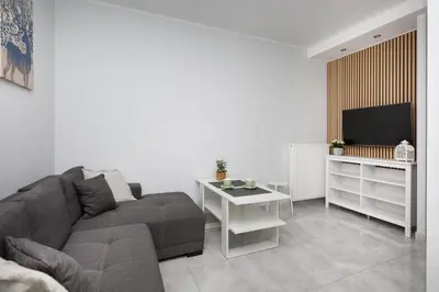 Telewizja i/lub zestaw kina domowego w obiekcie Apartamenty Cichy Zakątek