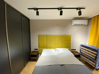 Łóżko lub łóżka w pokoju w obiekcie Apartament Wrocław Marina nad Odrą 7