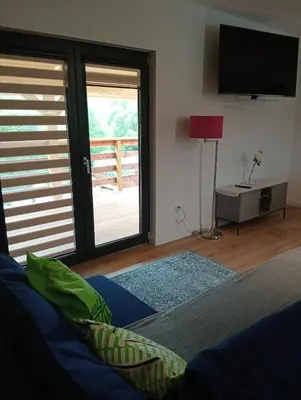Telewizja i/lub zestaw kina domowego w obiekcie Apartamenty Dzika Orlica