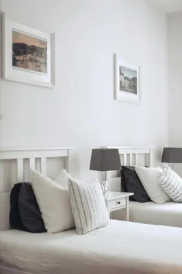 Łóżko lub łóżka w pokoju w obiekcie Apartament Rynek - Zielona Kamienica