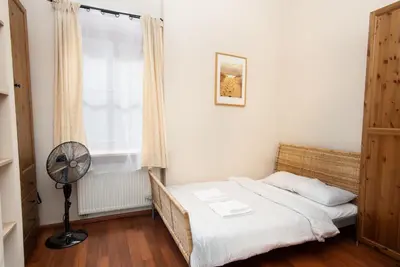 Łóżko lub łóżka w pokoju w obiekcie Klimatyczny apartament przy Rynku (1 min. pieszo!)