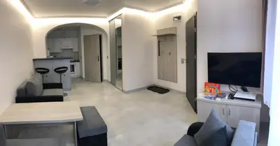 Telewizja i/lub zestaw kina domowego w obiekcie Za Rogiem
