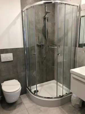 Łazienka w obiekcie Za Rogiem