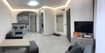Telewizja i/lub zestaw kina domowego w obiekcie Za Rogiem