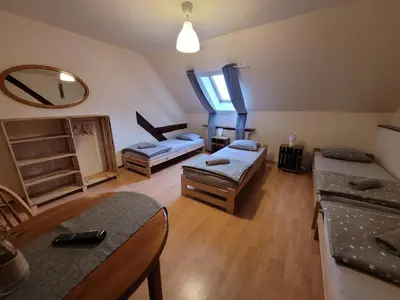 Łóżko lub łóżka w pokoju w obiekcie Agroturystyka Sielska Kraina