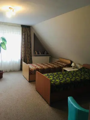 Łóżko lub łóżka w pokoju w obiekcie Agroturystyka Ostoja