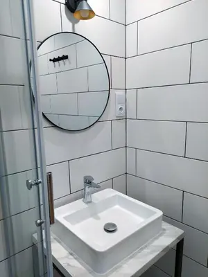 Łazienka w obiekcie OficynaApartments