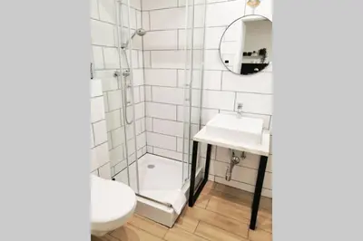 Łazienka w obiekcie OficynaApartments