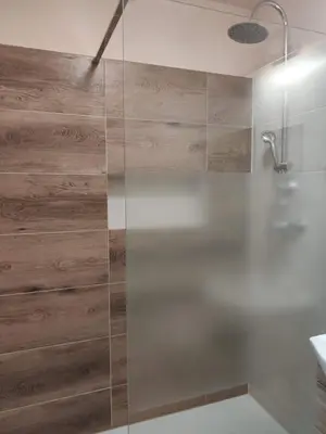 Łazienka w obiekcie Apartamenty i pokoje gościnne