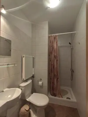 Łazienka w obiekcie Apartamenty i pokoje gościnne