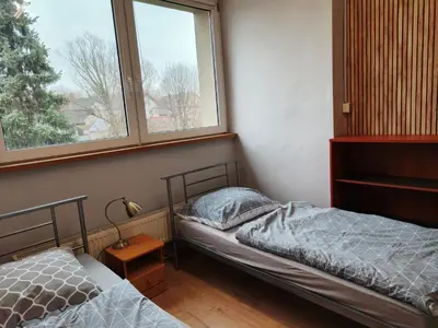 Łóżko lub łóżka w pokoju w obiekcie Hostel Lisięcice