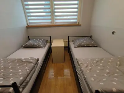 Łóżko lub łóżka w pokoju w obiekcie Hostel Lisięcice