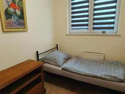 Łóżko lub łóżka w pokoju w obiekcie Hostel Lisięcice