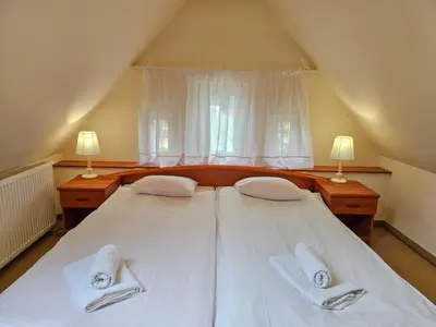 Łóżko lub łóżka w pokoju w obiekcie Willa Sanssouci