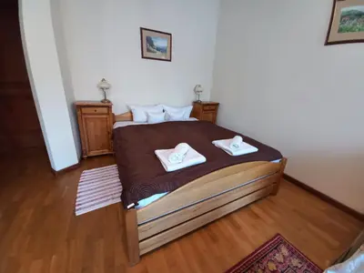 Łóżko lub łóżka w pokoju w obiekcie Szwajcarka Willa z sauną i jacuzzi