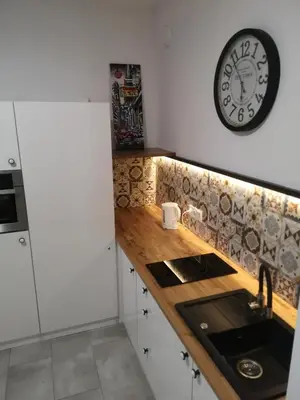 Kuchnia lub aneks kuchenny w obiekcie Apartamenty Lawendowy Zakątek 2