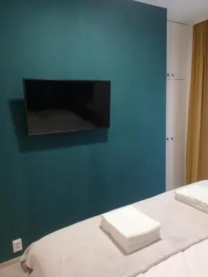 Łóżko lub łóżka w pokoju w obiekcie Apartamenty Lawendowy Zakątek 2