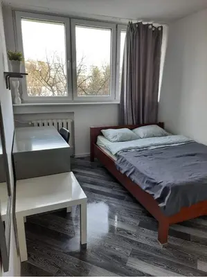 Łóżko lub łóżka w pokoju w obiekcie Blue River - Niedzwiedzia
