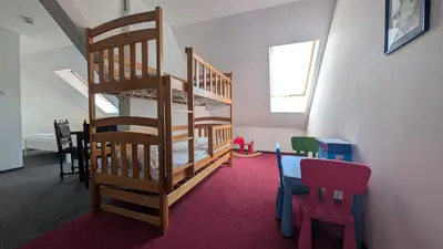 Łóżko lub łóżka w pokoju w obiekcie Rezydencja Dwór Górny