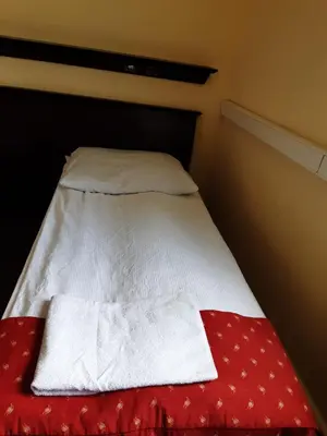 Łóżko lub łóżka w pokoju w obiekcie Noclegi Tyniec