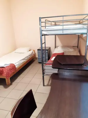 Łóżko lub łóżka w pokoju w obiekcie Noclegi Tyniec