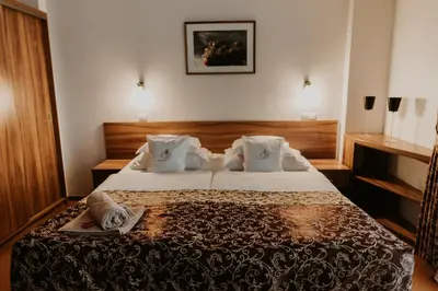 Łóżko lub łóżka w pokoju w obiekcie Hotel Dębowe Wzgórze Wellness & Spa