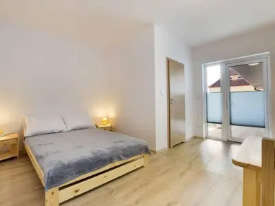 Łóżko lub łóżka w pokoju w obiekcie Pokoje Pod Gruszą -osobne wejścia